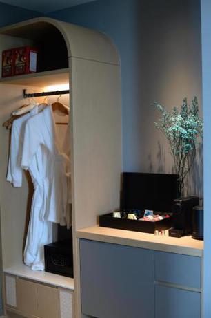 Imagen de la habitación del Hotel SSAW Boutique Wenzhou Dexin. Foto 18