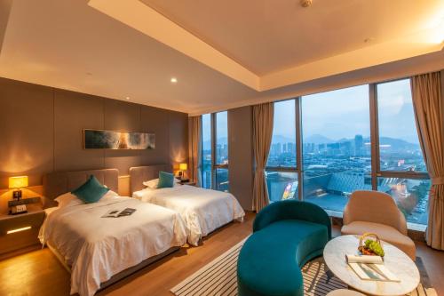 Imagen de la habitación del Hotel SSAW Boutique Wenzhou Dexin. Foto 19