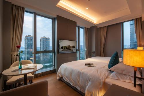 Imagen de la habitación del Hotel SSAW Boutique Wenzhou Dexin. Foto 20