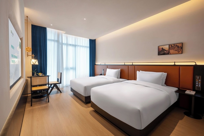 Imagen de la habitación del Hotel SSAW Garden Suzhou. Foto 2