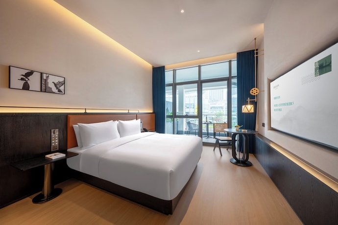 Imagen de la habitación del Hotel SSAW Garden Suzhou. Foto 4
