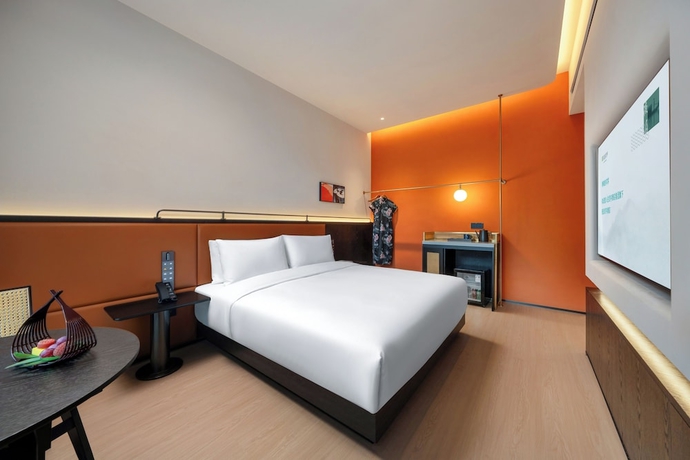 Imagen de la habitación del Hotel SSAW Garden Suzhou. Foto 7