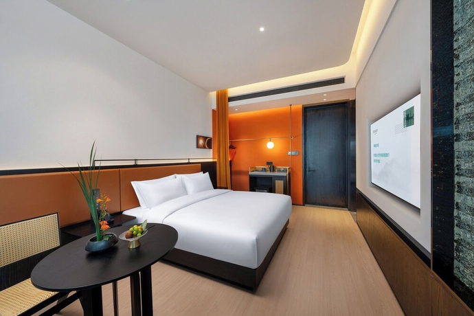 Imagen de la habitación del Hotel SSAW Garden Suzhou. Foto 8