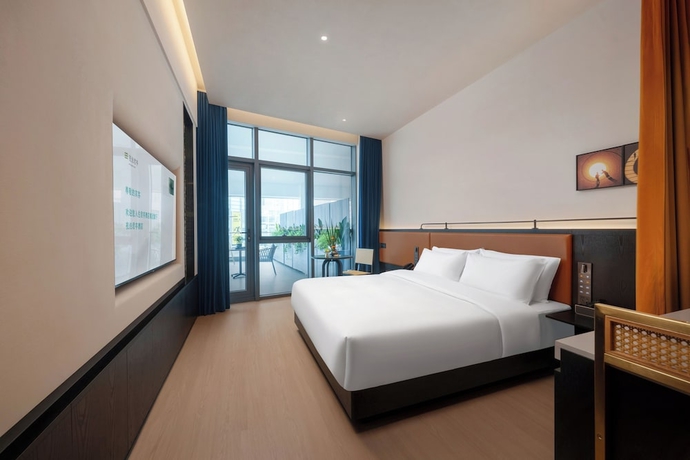 Imagen de la habitación del Hotel SSAW Garden Suzhou. Foto 9
