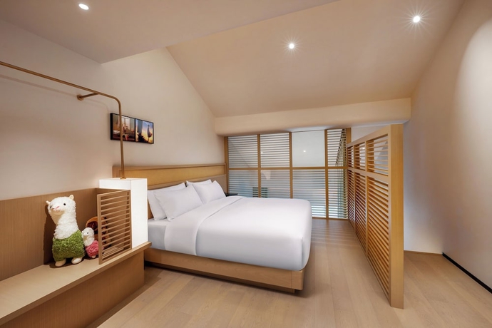 Imagen de la habitación del Hotel SSAW Garden Suzhou. Foto 10