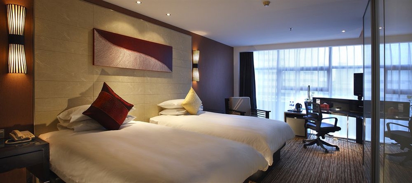 Imagen de la habitación del Hotel SSAW Plaza. Foto 8