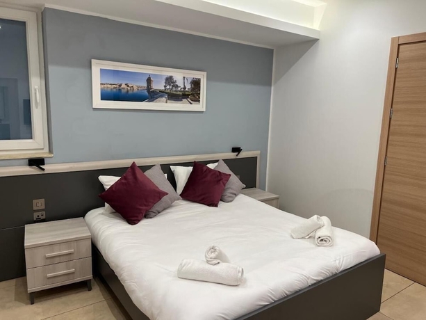 Imagen de la habitación del Hotel STAY AT 9020. Foto 5