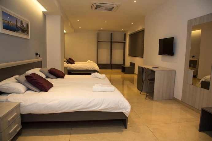 Imagen de la habitación del Hotel STAY AT 9020. Foto 9