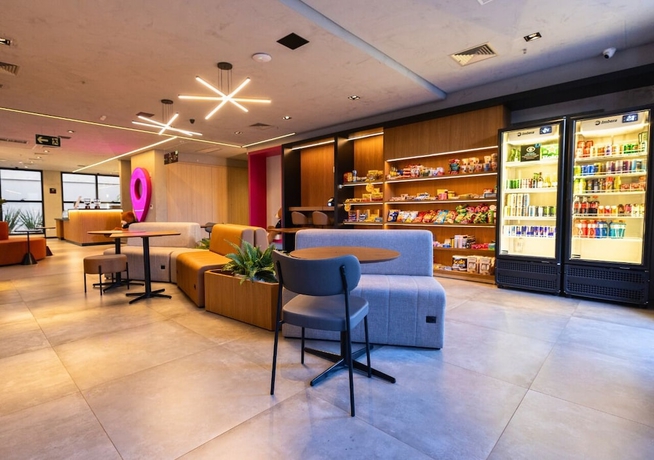 Imagen de los interiores del Hotel STAY Urb&agrave; Home. Foto 13
