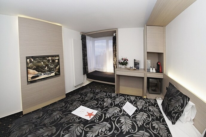 Imagen de la habitación del Hotel STEAUA DE MARE - Eforie Resor. Foto 14