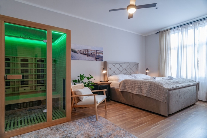 Imagen de la habitación del Hotel STING Boutique Apartments. Foto 11