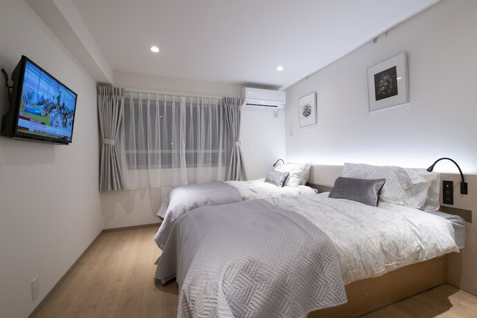 Imagen de la habitación del Hotel STUDIO INN NISHISHINJUKU. Foto 28