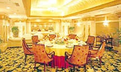 Imagen del bar/restaurante del Hotel SU YUAN FENG HUANG. Foto 4