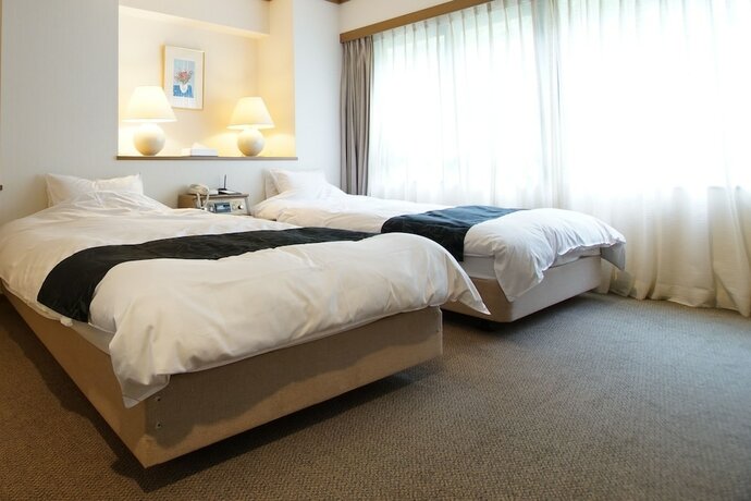 Imagen de la habitación del Hotel SUIZANSOU. Foto 22