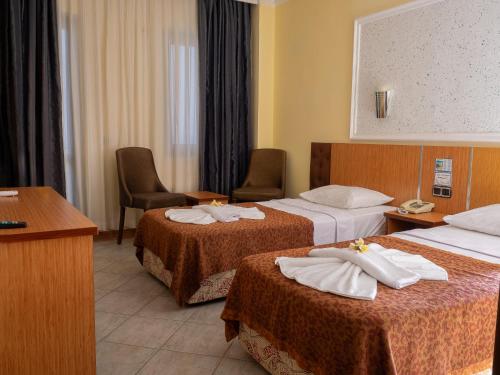 Imagen de la habitación del Hotel SUN FIRE BEACH. Foto 19