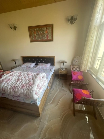 Imagen de la habitación del Hotel SUNS Cottage. Foto 3