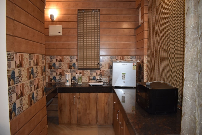 Imagen de la habitación del Hotel SUNS Cottage. Foto 14