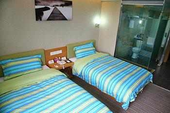 Imagen de la habitación del Hotel SUPER 8 HOTEL HANGZHOU XIA SHA XUE YUAN. Foto 4
