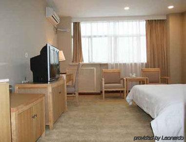 Imagen de la habitación del Hotel SUPER 8 YANGZHOU BAI XIANG. Foto 5