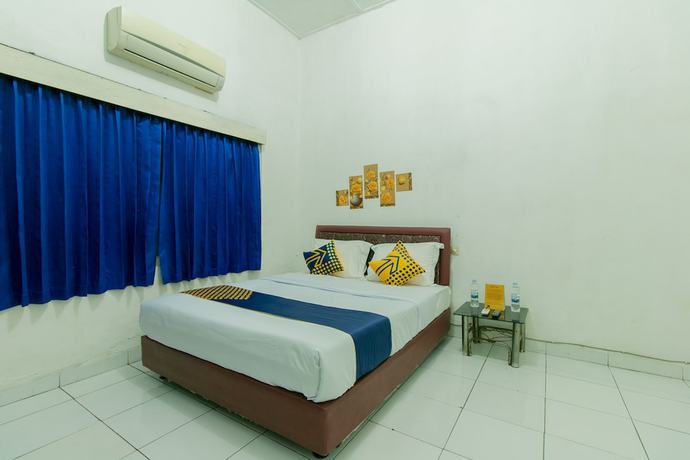 Imagen de la habitación del Hotel SUPER OYO 1707 Mustika Widyasari. Foto 2