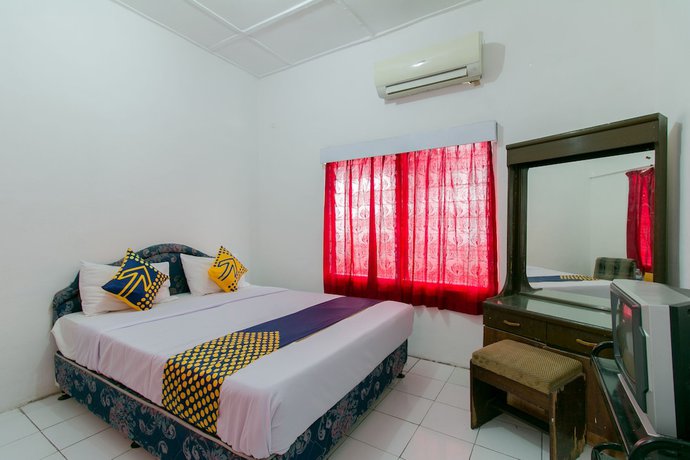 Imagen de la habitación del Hotel SUPER OYO 1707 Mustika Widyasari. Foto 10