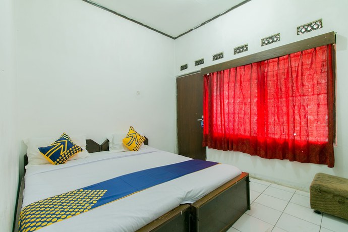 Imagen de la habitación del Hotel SUPER OYO 1707 Mustika Widyasari. Foto 16