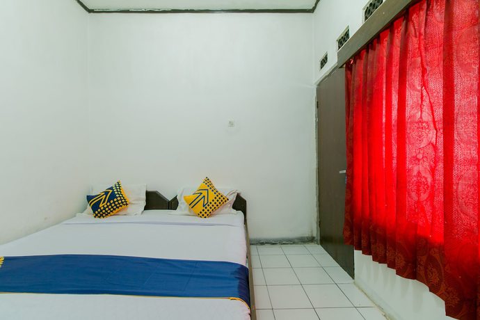 Imagen de la habitación del Hotel SUPER OYO 1707 Mustika Widyasari. Foto 17
