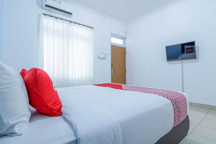 Imagen de la habitación del Hotel SUPER OYO 1755 De\'balcon Accomodation Near Ngurah Rai Airport. Foto 14