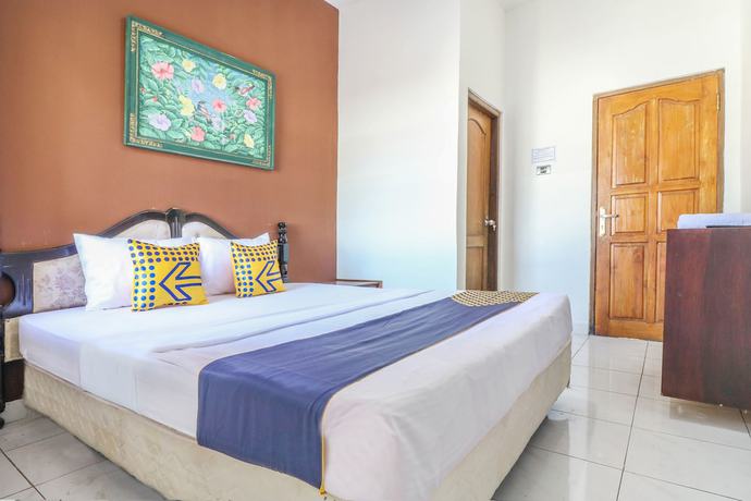 Imagen de la habitación del Hotel SUPER OYO 1927 Candra Adigraha. Foto 2