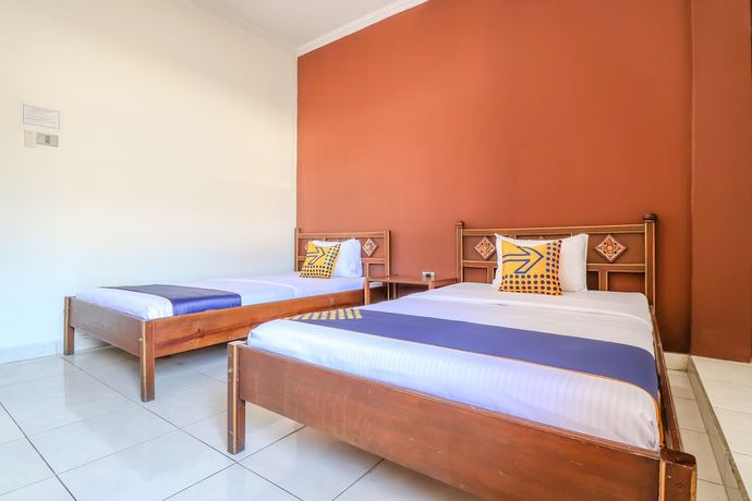 Imagen de la habitación del Hotel SUPER OYO 1927 Candra Adigraha. Foto 4