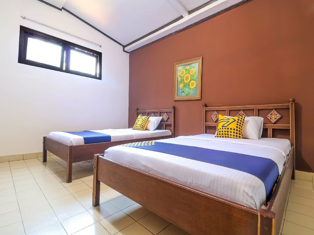 Imagen de la habitación del Hotel SUPER OYO 1927 Candra Adigraha. Foto 6