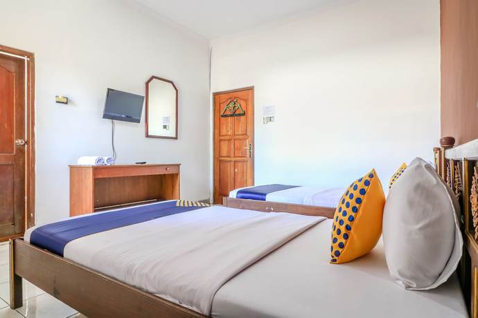 Imagen de la habitación del Hotel SUPER OYO 1927 Candra Adigraha. Foto 9