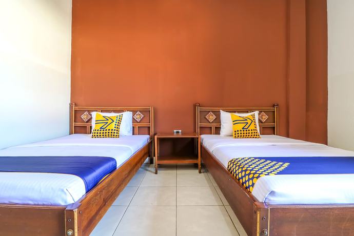 Imagen de la habitación del Hotel SUPER OYO 1927 Candra Adigraha. Foto 10