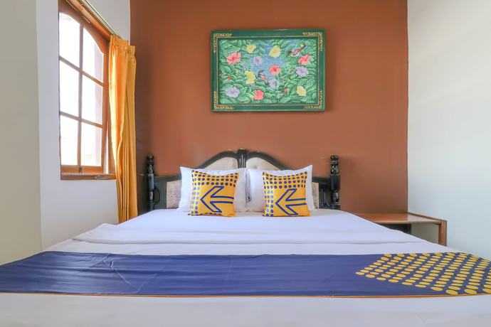 Imagen de la habitación del Hotel SUPER OYO 1927 Candra Adigraha. Foto 11