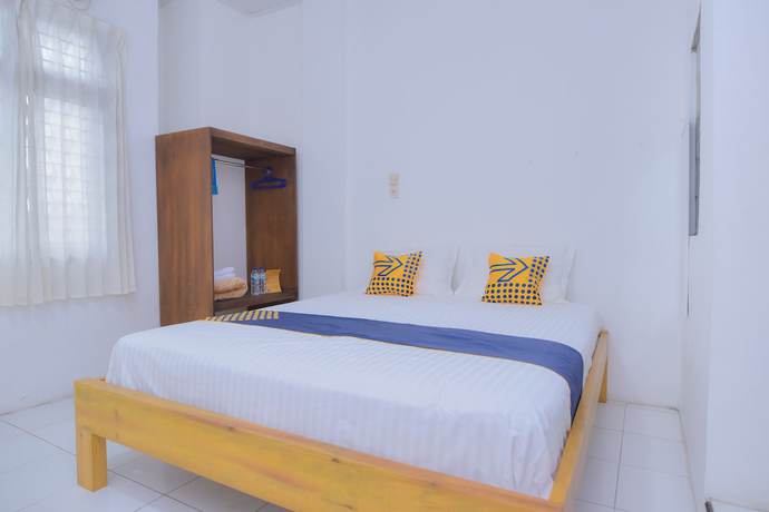 Imagen de la habitación del Hotel SUPER OYO 2134 Seunia. Foto 9