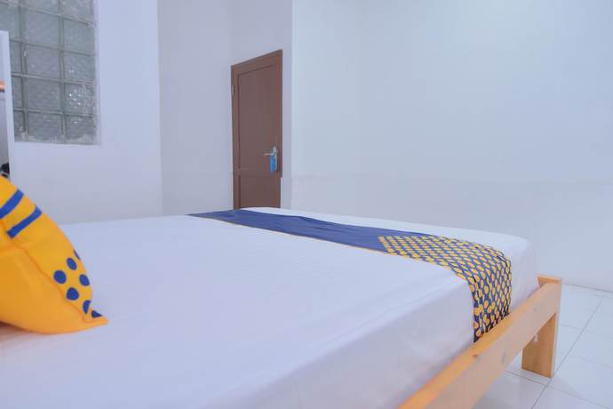 Imagen de la habitación del Hotel SUPER OYO 2134 Seunia. Foto 11