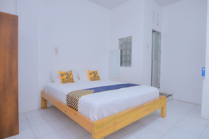 Imagen de la habitación del Hotel SUPER OYO 2134 Seunia. Foto 12