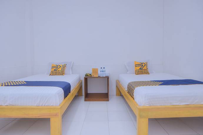 Imagen de la habitación del Hotel SUPER OYO 2134 Seunia. Foto 13