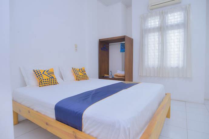 Imagen de la habitación del Hotel SUPER OYO 2134 Seunia. Foto 15