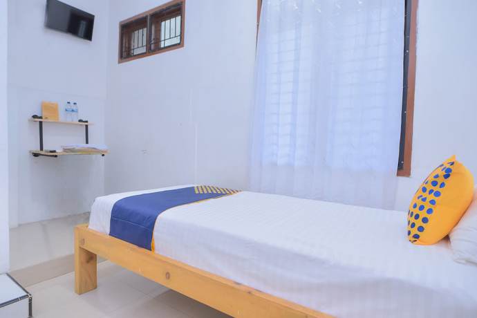 Imagen de la habitación del Hotel SUPER OYO 2134 Seunia. Foto 16