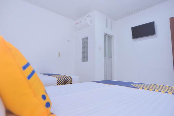 Imagen de la habitación del Hotel SUPER OYO 2134 Seunia. Foto 17