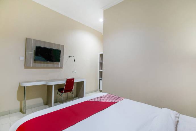 Imagen de la habitación del Hotel SUPER OYO 2320 Charvita. Foto 3