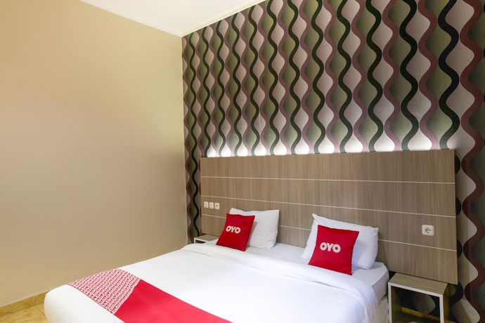 Imagen de la habitación del Hotel SUPER OYO 2320 Charvita. Foto 11