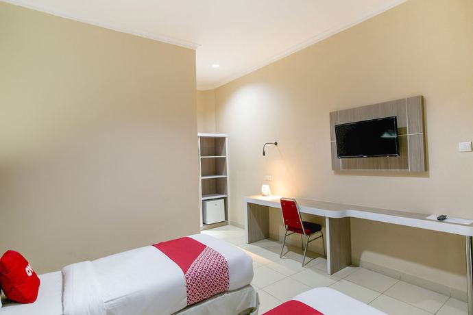 Imagen de la habitación del Hotel SUPER OYO 2320 Charvita. Foto 12