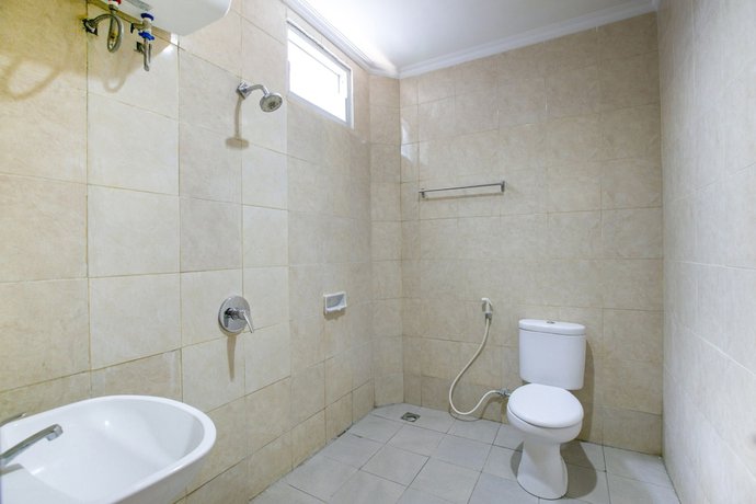 Imagen de la habitación del Hotel SUPER OYO 2320 Charvita. Foto 13