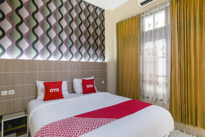 Imagen de la habitación del Hotel SUPER OYO 2320 Charvita. Foto 14