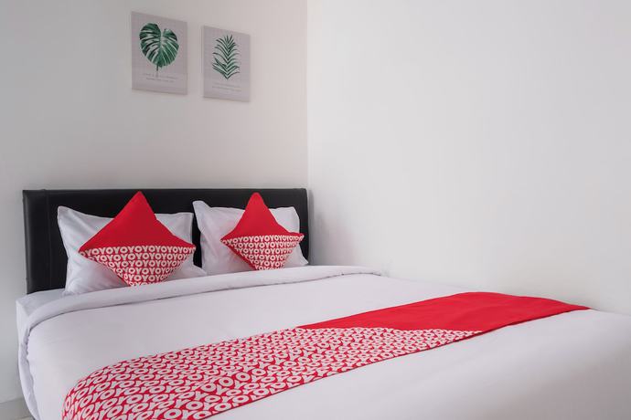 Imagen de la habitación del Hotel SUPER OYO 2919 Andung Residence. Foto 5