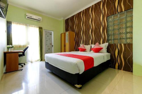 Imagen general del Hotel SUPER OYO 338 Guest House Omah Manahan Syariah. Foto 1