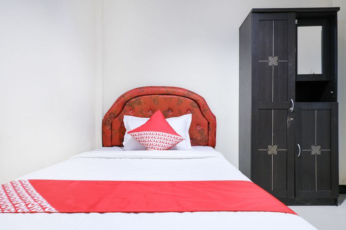 Imagen de la habitación del Hotel SUPER OYO 409 Pondok Helomi. Foto 2