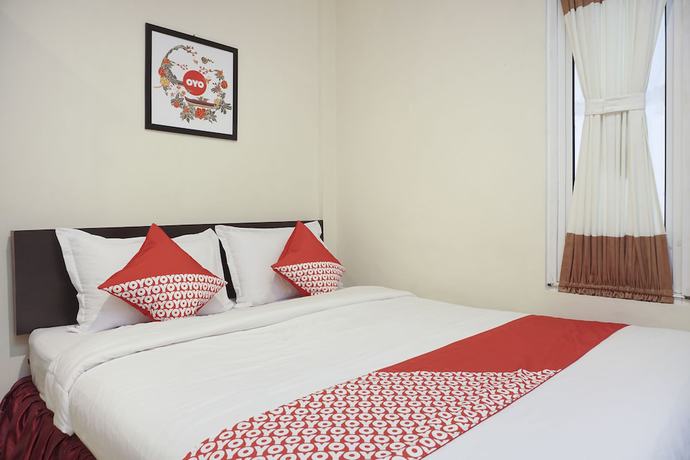 Imagen de la habitación del Hotel SUPER OYO 409 Pondok Helomi. Foto 6
